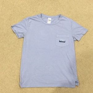 A periwinkle Victoria secret shirt